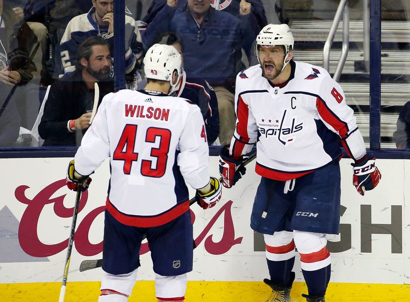 Washington Capitals left wing Alex Ovechkin (8) celebrates his first goal of the period against Columbus Blue Jackets goaltender Sergei Bobrovsky (72) with Washington Capitals right wing Tom Wilson (43) during the 2nd period of Game 6 in the Stanley Cup Playoffs first-round series at Nationwide Arena in Columbus, Ohio on April 23, 2018.