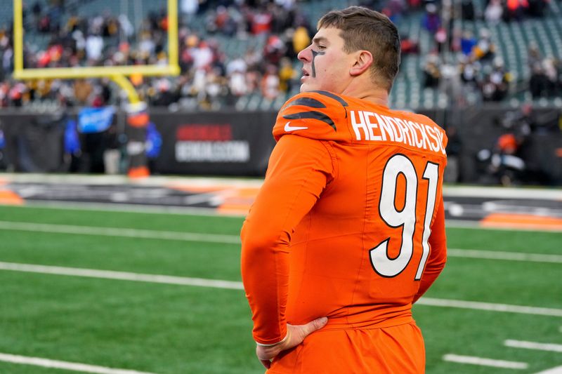 Cincinnati Bengals defensive end Trey Hendrickson (91) waits for the final whistle before running to the locker room at the end of the fourth quarter of the NFL Week 13 game between the Cincinnati Bengals and the Pittsburgh Steelers at Paycor Stadium in downtown Cincinnati on Sunday, Dec. 1, 2024. The Steelers won 44-38.