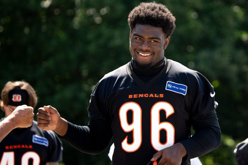 Cincinnati Bengals defensive end Cam Sample (96) walks to the practice field at the Bengals NFL practice in Cincinnati on Tuesday, June 4, 2024.