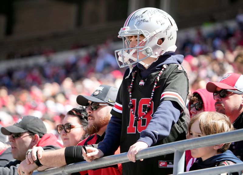 Ohio State Buckeye fan watches the Scarlet and Gary teams go up against each other during the spring game at Ohio Stadium on April 12, 2025.