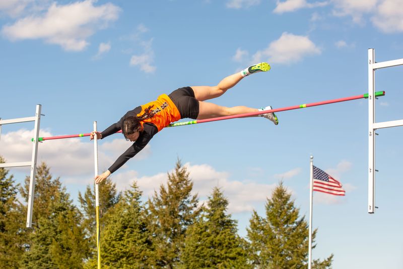Gibsonburg's McKenzie Montgomery clears the pole vault bar.