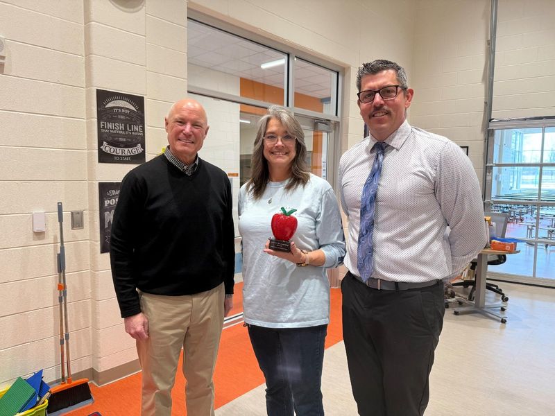 The Science Education Council of Ohio has recognized Lima Ridge Elementary Principal Kurt Scheiderer, right, with its Administrator Award for Leadership in Science Education. Chris Sommerkamp, middle, who leads the STEM lab, nominated Scheiderer for the award. Pictured with them in this file photo is Licking Heights Superintendent Kevin S. Miller.