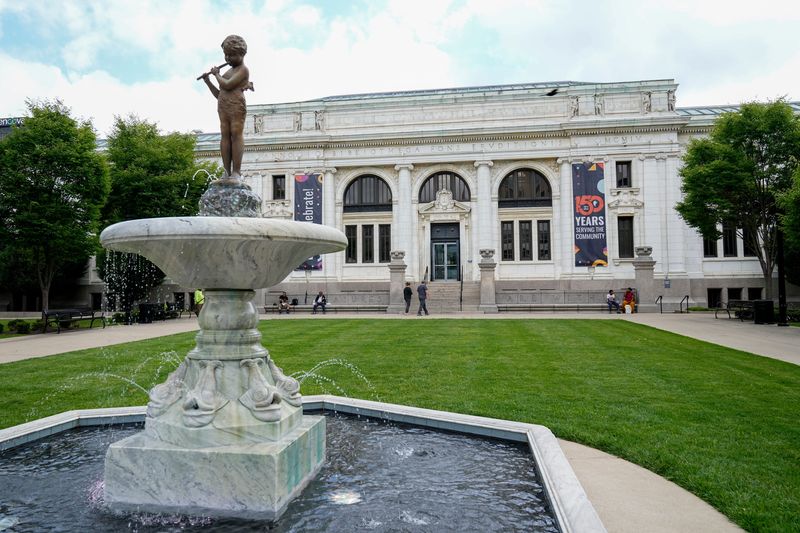 Aug 10, 2023; Columbus, Ohio, USA;  Visitors walk into the Columbus Metropolitan Library main branch.