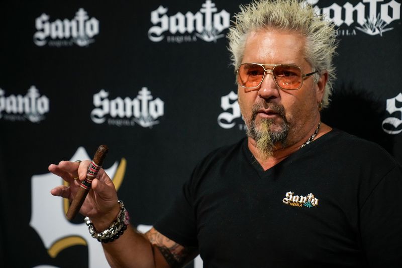 Food television personality Guy Fieri makes an appearance at Jungle Jim’s International Market to promote his new tequila venture, Santo, in Eastgate, Ohio, on Monday, May 5, 2025.