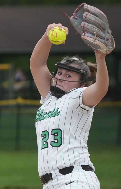 Mogadore relief pitcher Tali Bartholomew gets set to deliver against Rootstown during a game at Mogadore Softball Field in Lions Park on Monday, May 12, 2025 in Mogadore.