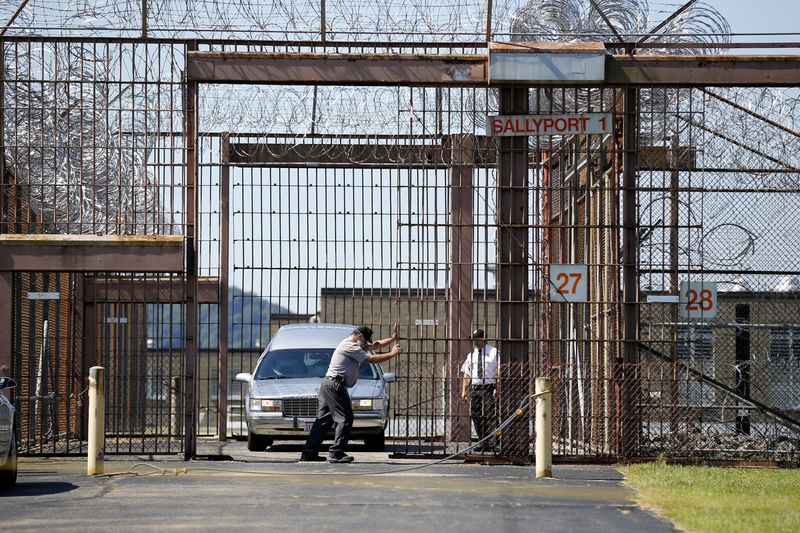 A hearse carrying the body of convicted murderer Robert Van Hook leaves the Southern Ohio Correctional Institute in Lucasville after he was executed Wednesday, July 18, 2018.