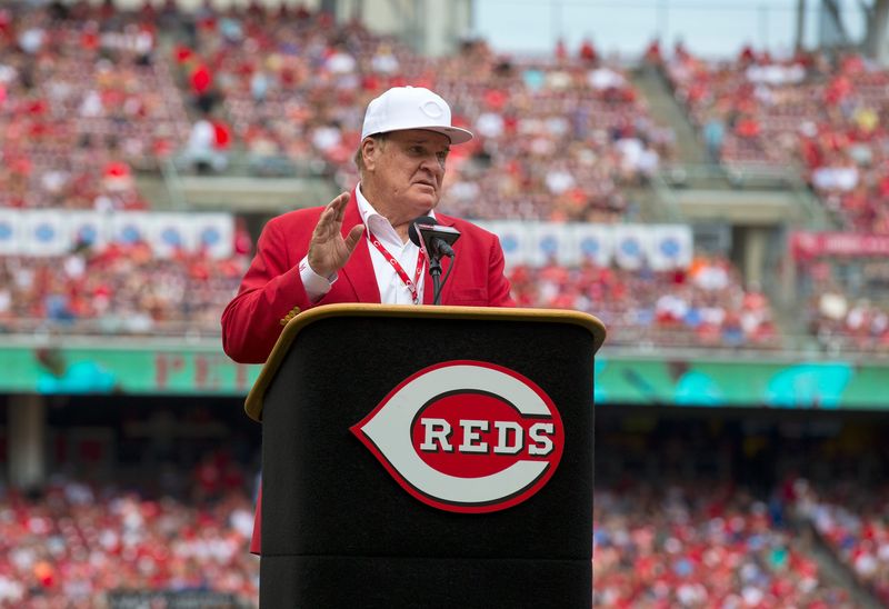 Pete Rose speaks during a pregame ceremony for the unveiling of a statue of Rose outside Great American Ball Park before a Cincinnati Reds MLB game.