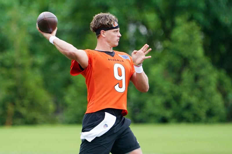 Cincinnati Bengals quarterback Joe Burrow (9) runs through drills during practice, Tuesday, May 13, 2025, at Kettering Health Practice Fields in Downtown Cincinnati.