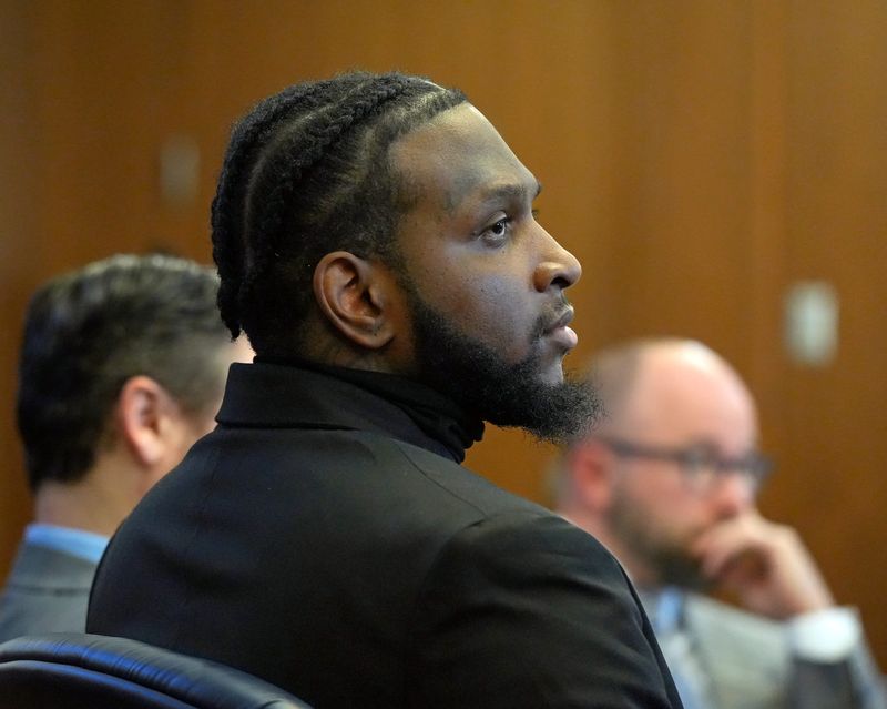 Ahmere Williams, 22 of Akron, listens as the state makes their opening statement on the first day of his murder trial in Judge Alison Breaux’s court at the Summit County Courthouse on Thursday, May 15, 2025, in Akron, Ohio.