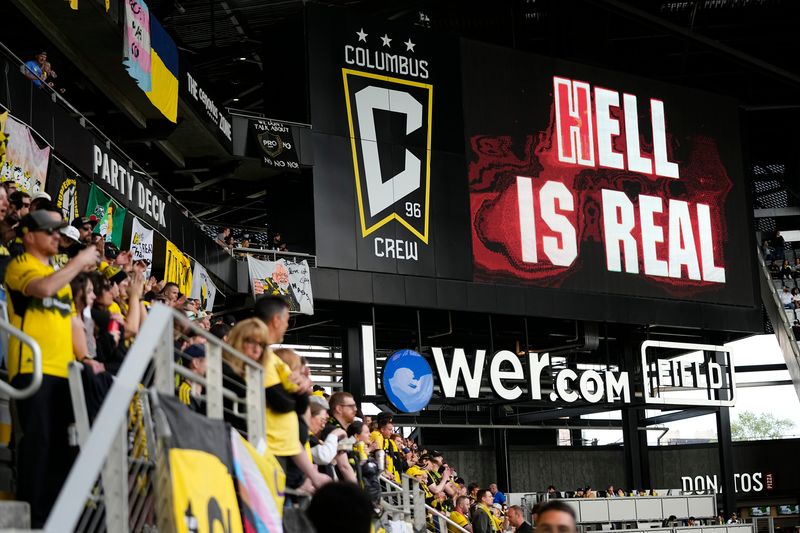 A Hell Is Real logo shows on the video board at Lower.com Field on May 17, 2025.