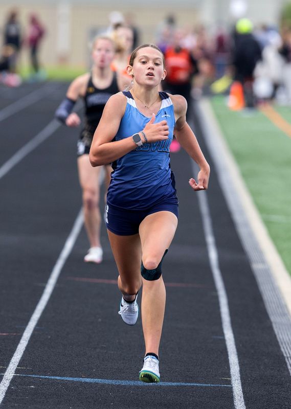 Louisville’s Kylah Meyer comes in second in the 1600 meter run at the D1 district finals held at Hoover High School Friday, May 23, 2025.