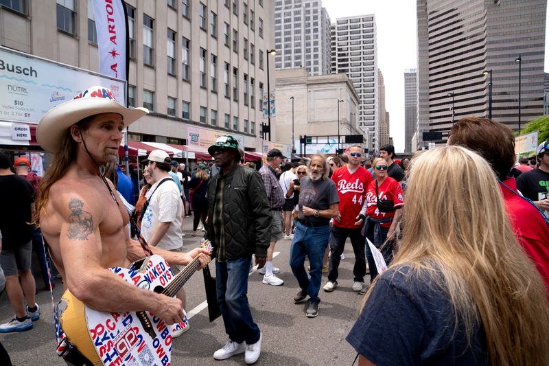 Robert Burck, known as the Naked Cowboy, spotted at this year's Taste of Cincinnati festival.