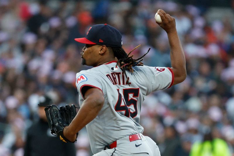 Cleveland Guardians starting pitcher Luis L. Ortiz throws a pitch against the Detroit Tigers on May 24, 2025, in Detroit, Michigan.