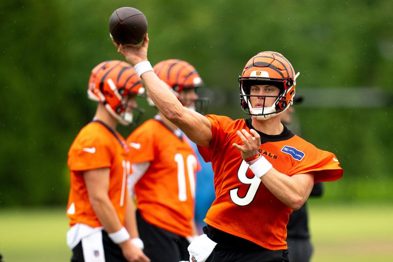 Cincinnati Bengals quarterback Joe Burrow (9) throws a pass during the Cincinnati Bengals practice in Cincinnati on Tuesday, May 27, 2025.