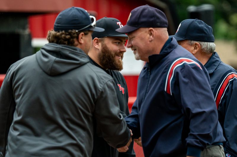 Head coaches from Buckeye Local and Tusky Valley baseball teams greet umpires before an OHSAA DV East Sectional Sectional Semifinal game, May 27, 2025, at Tusky Valley High School, in Zoarville, OH.