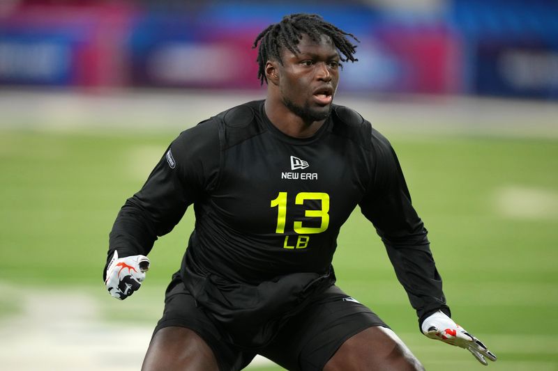 Feb 27, 2025; Indianapolis, IN, USA; South Carolina linebacker Demetrius Knight (LB13) participates in drills during the 2025 NFL Combine at Lucas Oil Stadium. Mandatory Credit: Kirby Lee-Imagn Images