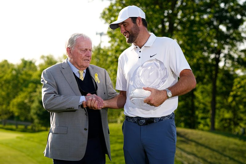 Scottie Scheffler shakes hands with Jack Nicklaus after winning the Memorial Tournament at Muirfield Village Golf Club in Dublin following the final round on June 1, 2025.