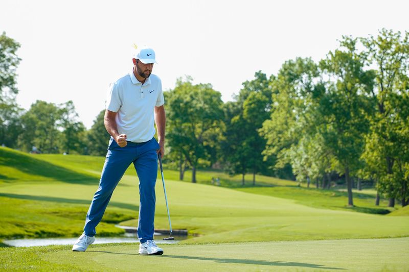 Scottie Scheffler reacts after sinking a putt on hole No. 14 during the final round of the Memorial Tournament at Muirfield Village Golf Course on Sunday, June 1, 2025 in Dublin, Ohio.