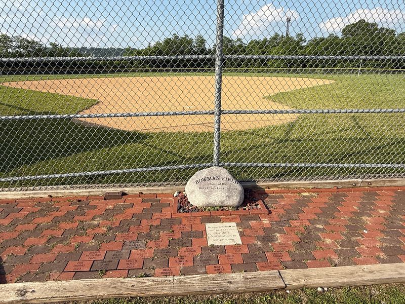 When Holy Cross’ seniors play their last home game, they receive a brick with their name and graduating year to add to the display behind home plate at Bowman Field.