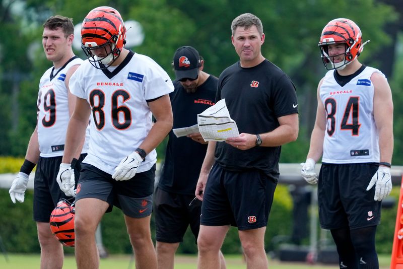 Cincinnati Bengals head coach Zac Taylor watches during a session of organized team activities on the Bengals practice field at Paycor Stadium in downtown Cincinnati on Tuesday, June 3, 2025.