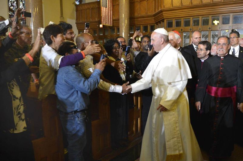 Pope Francis greets parishioners, immigrants and clients of Catholic Charities at St. Patrick’s Church in Washington in 2024.