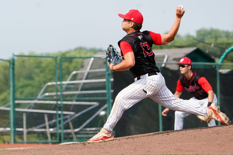 Lakota West Firebirds pitcher Adrian Smith (13) throws a pitch in the first inning of the OHSAA Division I Region 3 final high school baseball game between the Lakota West Firebirds and Moeller Crusaders, Wednesday, June 4, 2025, at Nischwitz Stadium in Fairborn, Oh.