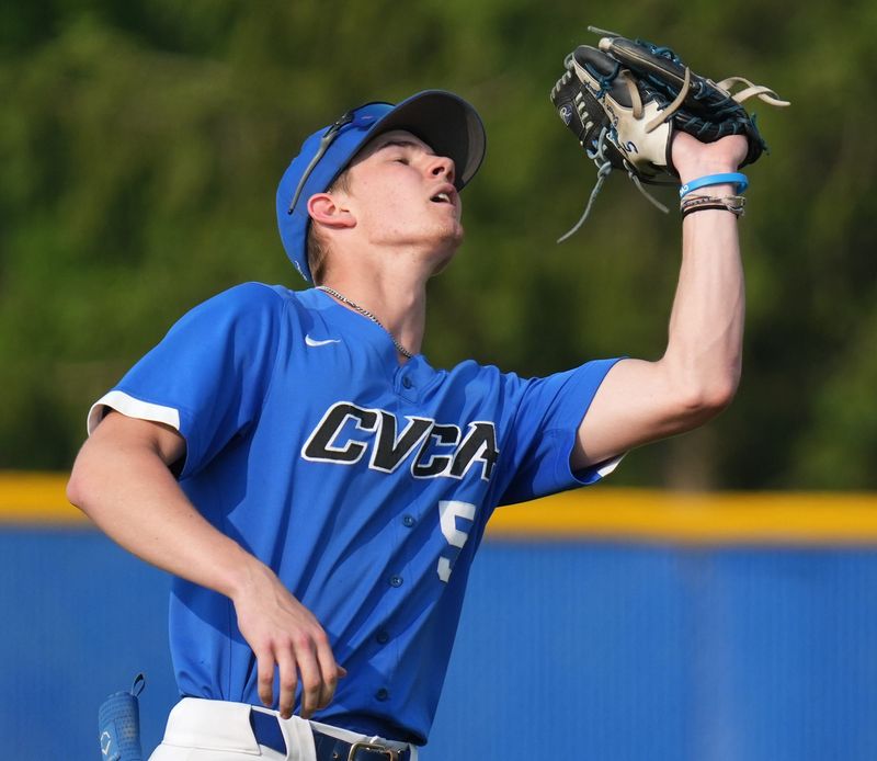 Cuyahoga Valley Christian Academy infielder Connor McGough catches an infield fly for an out against Wooster in the OHSAA Division III regional semifinal baseball game in Hudson Wednesday, June 4, 2025.
