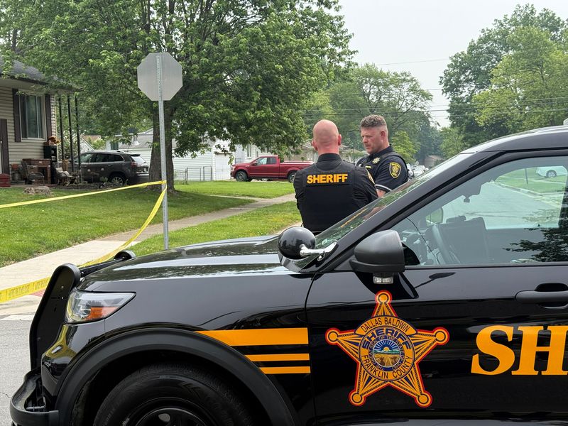Two Franklin County Sheriff's deputies assist an investigation June 5, 2025 into a shooting involving a Gahanna police officer. Authorities said officers were responding to a report of a person threatening suicide. One unidentified person was hurt when an officer opened fire. No officers were hurt in the incident.