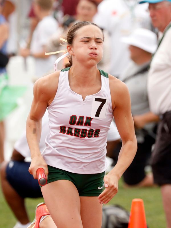 Olivia Cherry, of Oak Harbor, runs the 4x400 relay during the Division II state track and field meet on Saturday, June 7, 2025, at Ohio State's Jesse Owens Memorial Stadium.