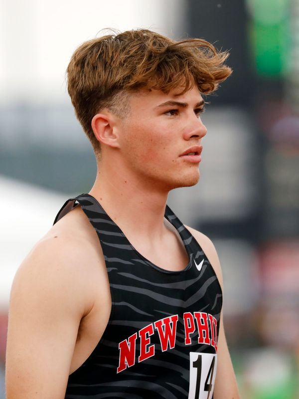 New Philadelphia's Marcus Adelman prepares to run the 3200 during the Division I state track and field meet on Saturday, June 7, 2025, at Ohio State's Jesse Owens Memorial Stadium.