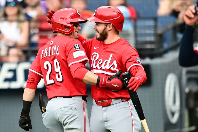 Center fielder TJ Friedl celebrates with Gavin Lux after hitting a solo home run in the fifth inning June 9. The homer gave the Reds a 4-3 lead and they would not trail again.
