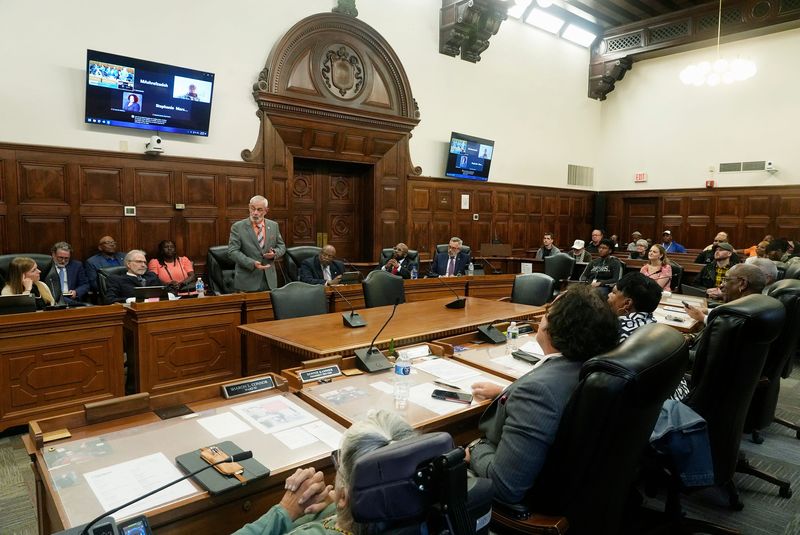Ward 6 Council Representative and President Pro Tem Brad McKitrick, standing center, addresses the use of profanity during the Akron City Council Meeting in Akron on Monday, June 9, 2025.