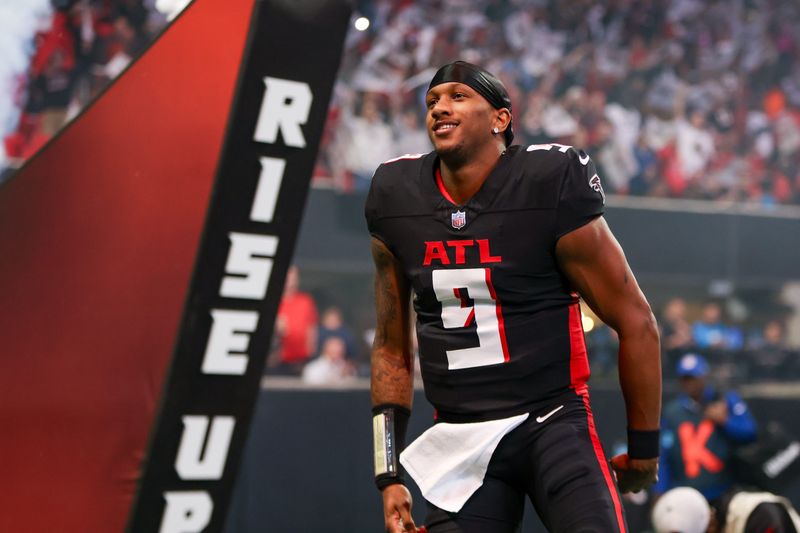 Jan 5, 2025; Atlanta, Georgia, USA; Atlanta Falcons quarterback Michael Penix Jr. (9) is introduced before a game against the Carolina Panthers at Mercedes-Benz Stadium. Mandatory Credit: Brett Davis-Imagn Images
