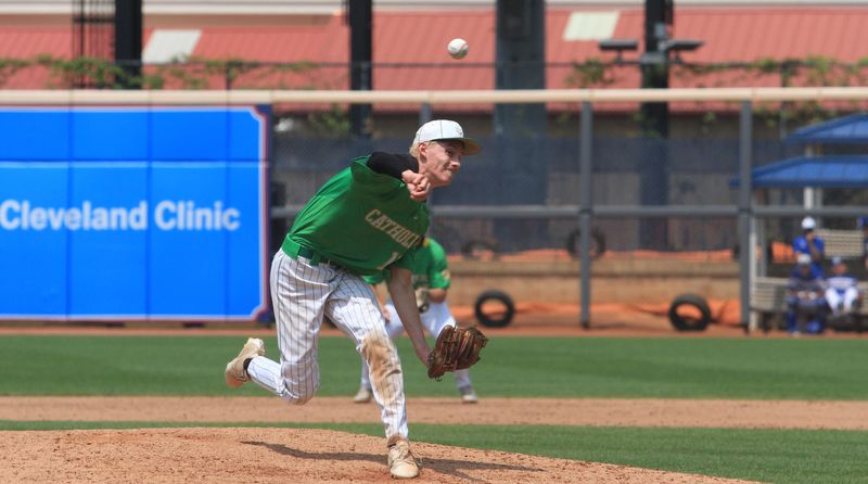 Newark Catholic's Miller Hutchison pitches during the Green Wave's 6-4 victory against Tiffin Calvert in a Division VII state semifinal June 12 at Canal Park in Akron.