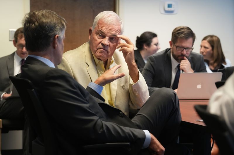 Former FirstEnergy executive Dennis Chack listens to his attorney June 13, 2025 at a Public Utilities Commission of Ohio hearing about his knowledge of House Bill 6. FirstEnergy fired Chack and others after a massive pay-to-play investigation became public in 2020. Chack has not been charged in state or federal courts.