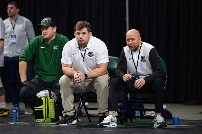 Josh Moore, far right, comes to Kent State's wrestling program with 21 years of coaching experience.