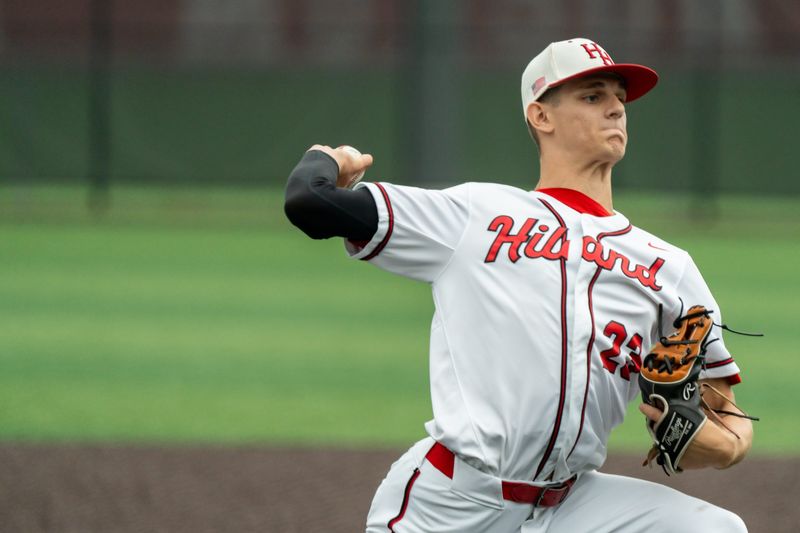 Starting pitcher Caden Coblentz (23) of the Berlin Hiland Hawks delivers a pitch during an OHSAA DIV State Baseball Tournament Semifinal game against the Fairview Apaches, at Thurman Munson Stadium, in Canton, OH, June 14, 2025.