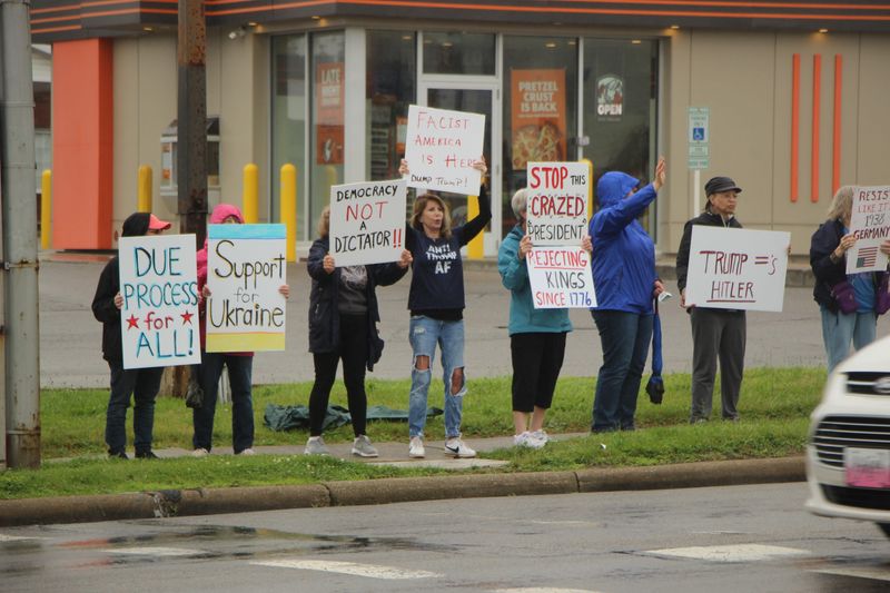 Protesters lined Park Avenue West during the No Kings rally on Saturday morning.