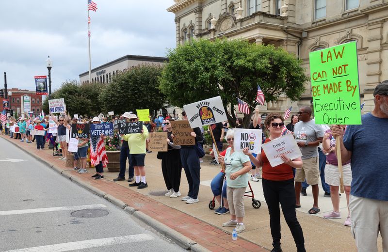 Over 250 people showed for downtown Zanesville's No King protest June 14. The rally, with around 1,800 similar ones across the United States, was part of a nationwide protest against Donald Trump's perceived overreach and a rejection of the idea of a "king" in America.