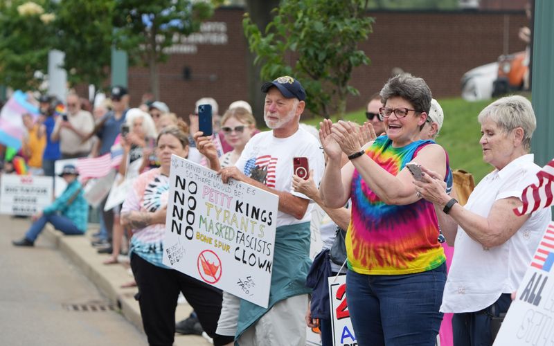 Protesters line Market Avenue in downtown Canton at the No Kings Day protest Saturday, June 14, 2025.