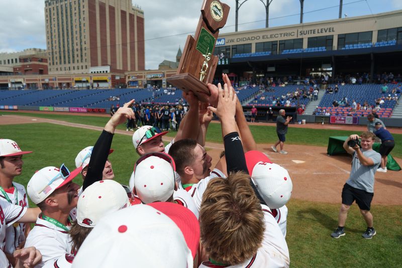 The Hiland Hawks celebrate their win over the Lake Center Christian Tigers, during an OHSAA DVI State Baseball Tournament Championship game, at Canal Park, in Akron, OH, June 15, 2025.