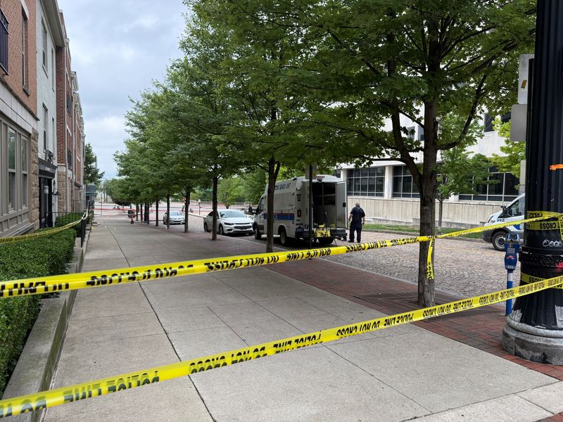Columbus police investigate an early morning June 14 shooting near the intersection of South Ludlow and West Town streets near the Scioto River, Downtown. Investigators were still at the scene that morning as marchers lined up for the Stonewall Columbus Pride March.