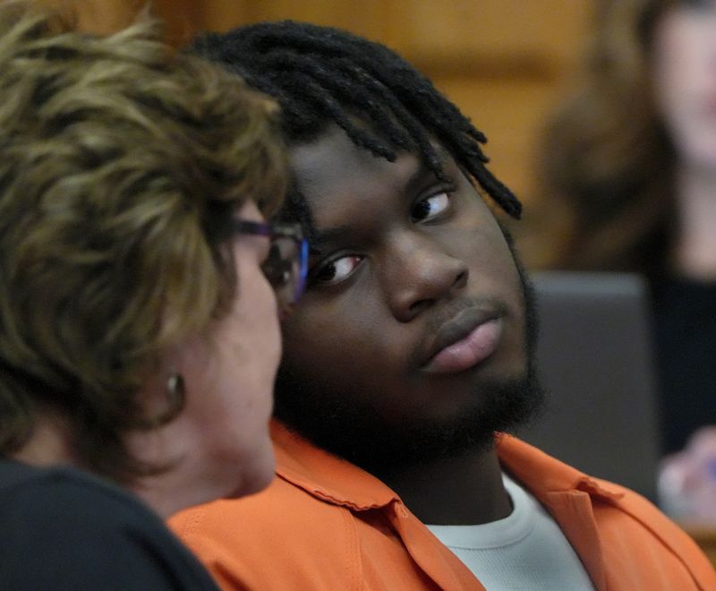 Jordan Worthey-Sturdivant looks to his lawyer Michelle Stine Makkos as Stark County Common Pleas Judge Frank G. Forchione sentenced him June 16 for assaulting a fellow inmate at Indian River Juvenile Correction Facility in Massillon.