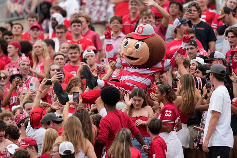 Aug 31, 2024; Columbus, OH, USA; Brutus crowd surfs up the Block O student section during the second half of the NCAA football game between the Ohio State Buckeyes and the Akron Zips at Ohio Stadium. Ohio State won 52-6.