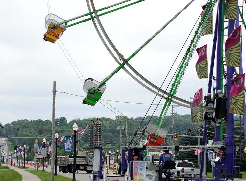 A Ferris wheel is stationed on a closed section of Fulton Drive NW near the tennis courts at North Park in preparation for the Jackson Community Celebration. The event continues through June 21.
