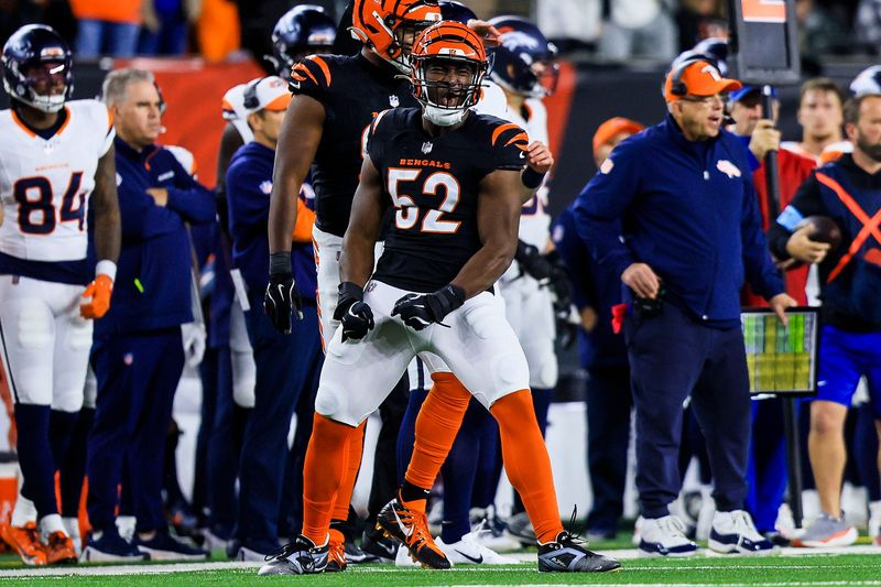 Dec 28, 2024; Cincinnati, Ohio, USA; Cincinnati Bengals defensive end Cedric Johnson (52) reacts after a play against the Denver Broncos in the first half at Paycor Stadium. Mandatory Credit: Katie Stratman-Imagn Images
