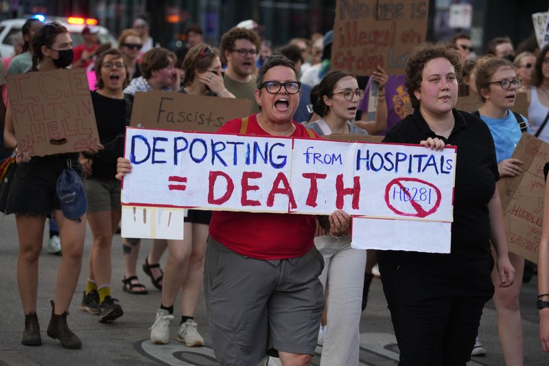 Sara Provencale and her daughter, Zampa, were among the protesters against ICE deportations who marched June 18, 2025, who gathered at Columbus City Hall, then later marched through the streets of downtown Columbus in a loop that returned to city hall.