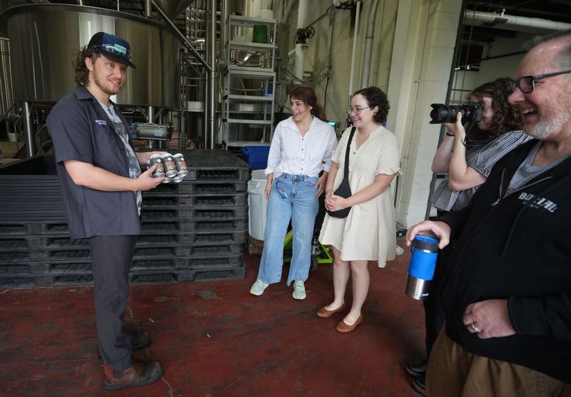 Wolf's Ridge Brewery's head of brewery production and operations, Bryan Steller (left), meets with Columbus staff members at the Hague Avenue brewery and warehouse Thursday, June 19, 2025. Beside Steller are (from left) reporters Sophia Veneziano, Anna Lynn Winfrey, Sarah Sollinger and marketing staff member Eric Wygle.