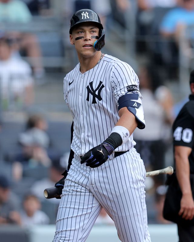 Jun 19, 2025; Bronx, New York, USA; New York Yankees right fielder Aaron Judge (99) reacts after striking out during the first inning against the Los Angeles Angels at Yankee Stadium. Mandatory Credit: Brad Penner-Imagn Images