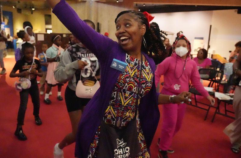 Ohio History Connection staff member Valerie Boyer celebrates Juneteenth by dancing with children at a Juneteenth celebration at the Ohio History Center on June 19, 2025. She is a native of Galveston, Texas, where Juneteenth originated.